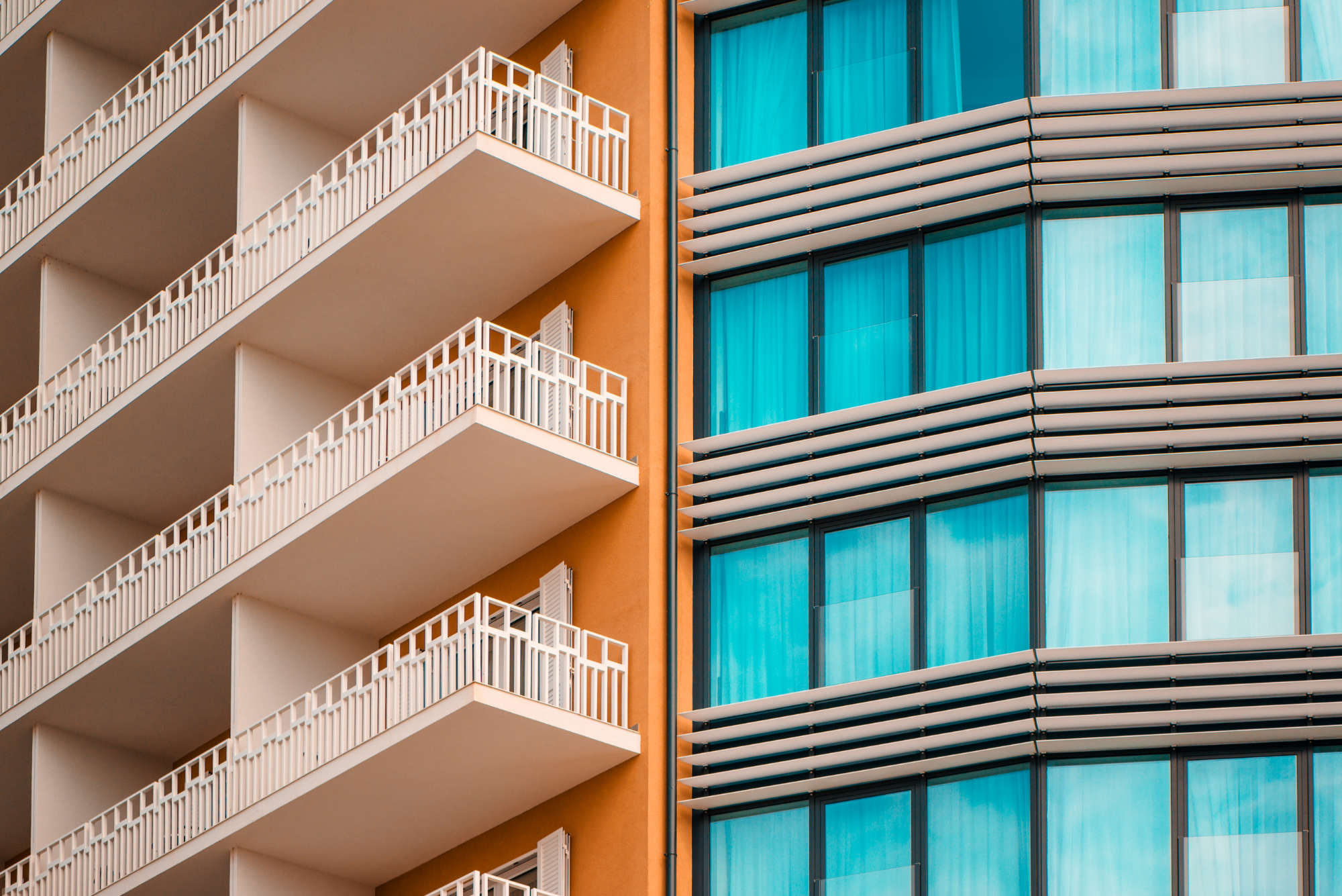 orange-and-teal-modern-building-facade-PH2QZAU.jpg